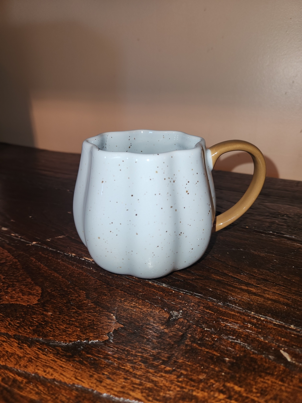 Speckled White Ceramic Mug with Tan Handle